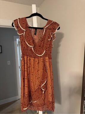 De Colores Ruffled Polka Dot Midi Dress in Rust